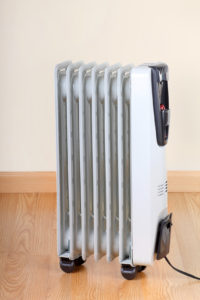 Space heater safety is a huge part of our winter electrical safety tips this season!