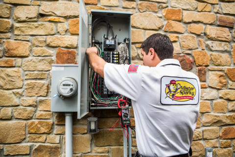 Mister Sparky Electrician Tulsa finishing up an electrical panel repair