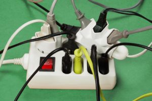 Avoiding overloaded surge protectors to avoid house fires.